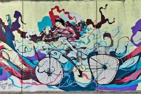 street-art-in-bicicletta-murales-mart-hopnn image